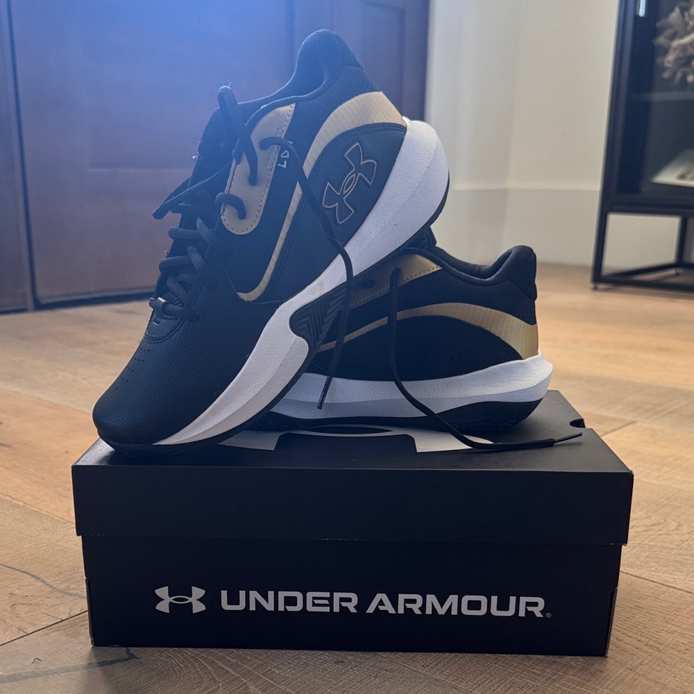 Under Armour Men's Athletic Shoes in Black and Gold